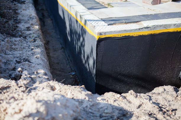 Professional Emergency Waterproofing technician working in Sassamansville, PA
